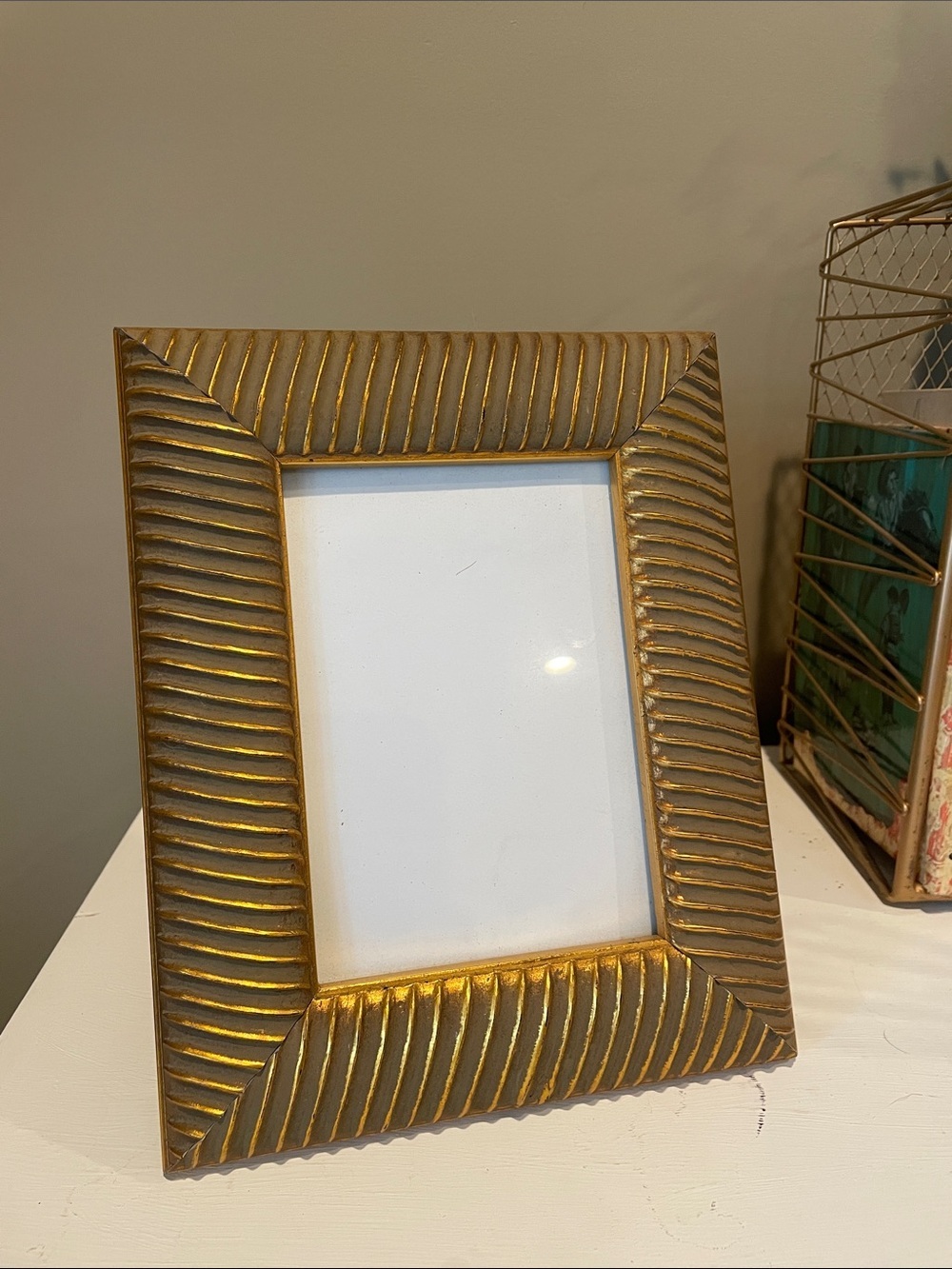 Gold detailed photo frame holds 5x7